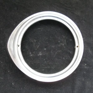 1956 Chrysler headlight door left Nyhet