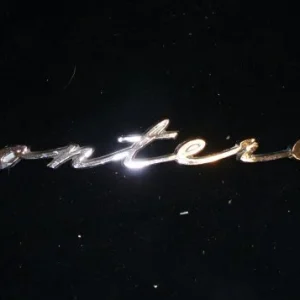 1963 Mercury emblem left Lågt pris