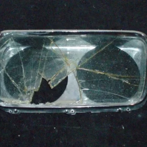 Utförsäljning 1965 Imperial headlight door left (bad glass, good chrome)