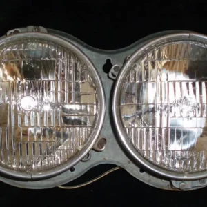 1957 Plymouth headlight pot right Outlet