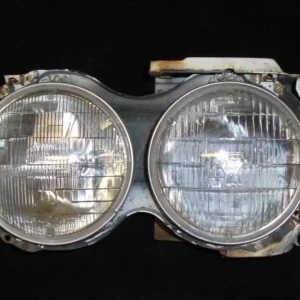 1963 Cadillac headlight pot right Köp nu